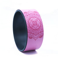 pink yoga wheel for flexibility and back stretching