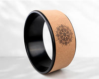 black PU yoga wheel for Pilates and fitness exercises