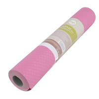 rolled pink and white TPE yoga mat