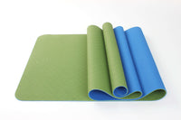 green TPE yoga mat for exercise and stretching