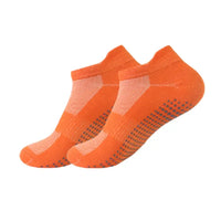 Orange women's non-slip yoga socks for fitness workouts