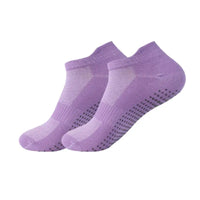 Purple women's non-slip yoga socks with grip sole