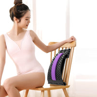Person using adjustable back stretcher for back stretching