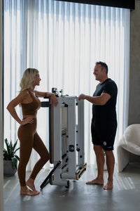 The Queen foldable Pilates reformer in home workout space