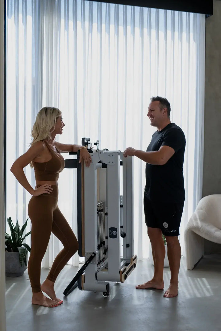 The Queen foldable Pilates reformer in home workout space